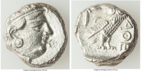 ATTICA. Athens. Ca. 393-294 BC. AR tetradrachm (21mm, 16.68 gm, 8h). AU, countermark, porosity. Late mass coinage issue. Head of Athena with eye in tr...