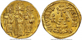 Heraclius (AD 610-641), with Heraclius Constantine and Heraclonas. AV solidus (19mm, 4.38 gm, 7h). NGC MS 4/5 - 2/5, scratches. Constantinople, 7th of...
