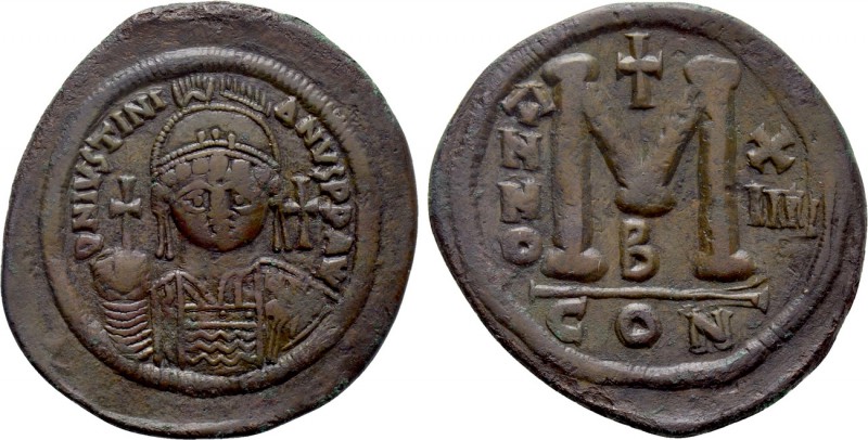 JUSTINIAN I (527-565). Follis. Constantinople. 

Obv: D N IVSTINIANVS P P AVI....