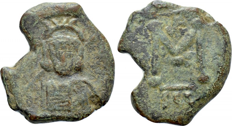 CONSTANTINE IV POGONATUS (668-685). Follis. Syracuse. 

Obv: Crowned and cuira...