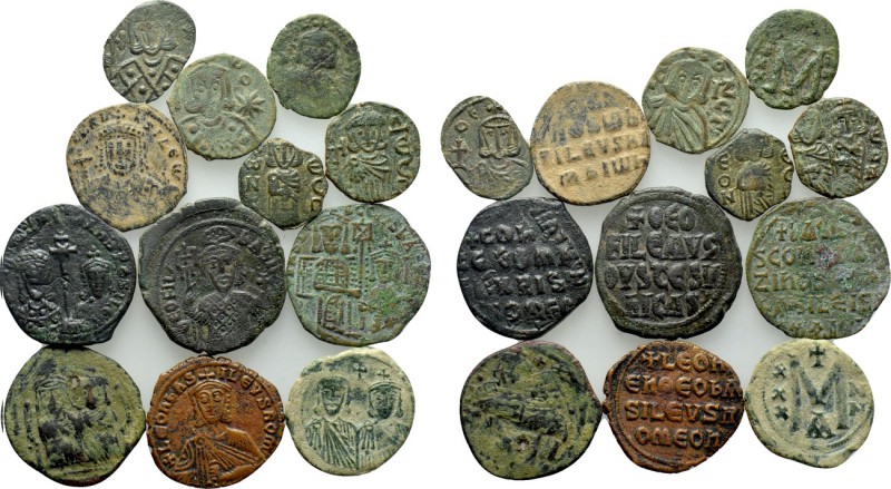 12 Byzantine Coins of the 8th to 10th Century. 

Obv: .
Rev: .

. 

Condi...