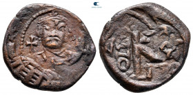 Leontius AD 695-698. Constantinople. Half Follis or 20 Nummi Æ