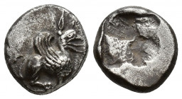 Greek Coins
IONIA. Teos. Hemidrachm Circa 500-460 BC Griffin seated right.Rough incuse square
Weight: 2.84 Diameter: 12.6