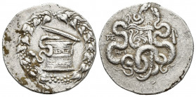 Greek Coins
LYDIA, Tralleis(?) AR Cistophoric Tetradrachm. Circa 155-145 BC. Serpent emerging from cista mystica; the whole within wreath / Two serpen...