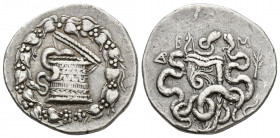 Greek Coins
LYDIA, Tralleis(?) AR Cistophoric Tetradrachm. Circa 155-145 BC. Serpent emerging from cista mystica; the whole within wreath / Two serpen...