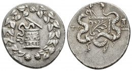 Greek Coins
LYDIA, Tralleis. Circa 166-67 BC. AR Tetradrachm Cistophoric type. Struck 155-145 BC. Cista mystica with serpent; all within ivy wreath / ...
