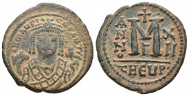 Byzantine
Maurice Tiberius Follis or 40 Nummi Ae AD 582-602. Theoupolis Antioch DN MaYP-[AYT], emperor wearing consular robes, mappa and eagle-tipped ...