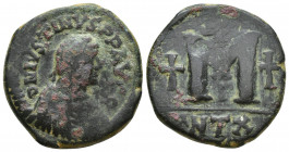 Byzantine
JUSTIN I AD 518-527 Follis. Antioch. D N IVSTINVS P P AVG. Diademed, draped and cuirassed bust right. Large M; cross to left, right and abov...