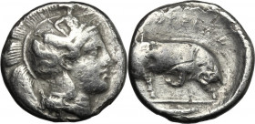 Greek Italy. Southern Lucania, Thurium. AR Stater, 400-350 BC. Obv. Head of Athena right, helmeted; helmet decorated with Scylla. Rev. Bull charging r...