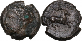Punic Sicily. AE 17 mm, late 4th-early 3rd century BC. Obv. Head of Tanit left, wearing wreath of grain. Rev. Horse prancing right. SNG Cop. 94-97. AE...