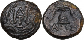 Continental Greece. Kings of Macedon. Demetrios I Poliorketes (306-283 BC). AE Half unit, Pella mint. Obv. Macedonian shield; in the centre, monogram ...
