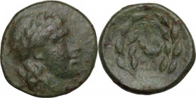 Continental Greece. Achaia, Pellene. AE 17 mm, 370-322 BC. Obv. Laureate head of Apollo right. Rev. Head of ram within laurel wreath. BMC 10; SNG Cop....