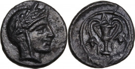 Greek Asia. Bithynia, Kios. AE 12 mm, 325-300 BC. Obv. Head of Mithras right, wearing Persian tiara with laurel wreath. Rev. Kantharos with bunches of...