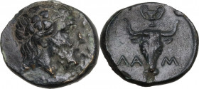 Greek Asia. Troas, Lamponeia. AE 12 mm, 4th century BC. Obv. Head of Dionysos right, bearded and wearing ivy-wreath. Rev. Bucranium; above, kantharos....