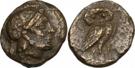 Greek Asia. Aeolis, Neonteichos. AE 10 mm, 300-100 BC. Obv. Helmeted head of Athena right. Rev. Owl standing right, head facing, wings closed. SNG Cop...