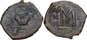 Heraclius (610-641). AE Follis, Nicomedia mint, dated RY 1 (610). Obv. Crowned and draped bust facing, holding cross. Rev. Large M. D.O. 153; MIB 174;...