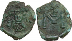Constans II (641-668). AE Follis, 643-647, Syracuse mint. Obv. Bust facing, crowned, draped, holding globus cruciger. Rev. Large M; above, monogram. D...