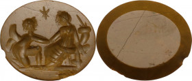 Carnelian intaglio, designed for a seal. Engraved with two figures clasping hands, one winged, kneeling, and the other seated, holding cornucopiae. Ro...