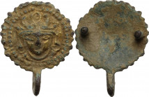 Gilt bronze applique with face. Roman period, 2nd - 4th century AD. Diameter: 22 mm.