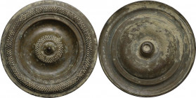 Large bronze applique with geometric decorations. Roman period, 1st-3rd century AD. Diameter 65 mm.