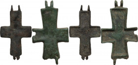 Lot of two framents of bronze enkolpion. Byzantine, 9th-11th century AD. 54 x 21 mm. 20.14 g.