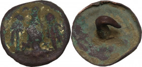 AE (gilded) Button with eagle standing front, head left, wings open. Diameter: 20 mm. Medieval period, c. 8th-12th century.