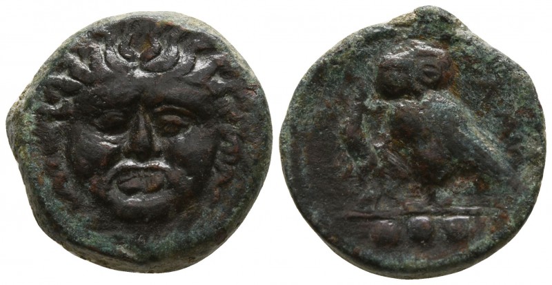 Sicily. Kamarina circa 420-405 BC.
Tetras Æ

13mm., 3,64g.

Facing gorgonei...