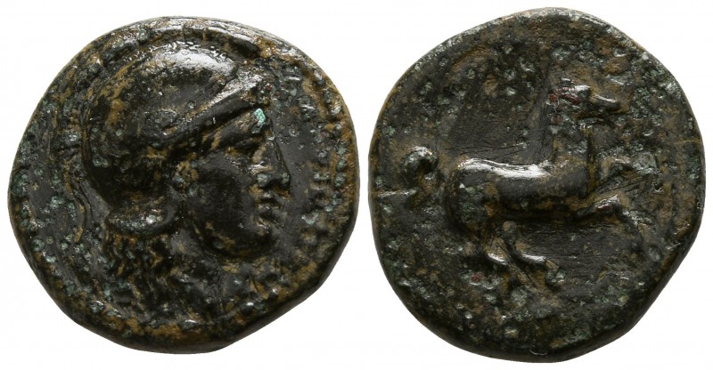 Sicily. Kamarina circa 339-300 BC.
Trias Æ

15mm., 3,33g.

Helmeted head of...