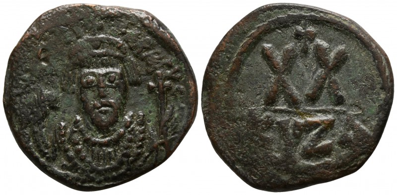 Phocas. AD 602-610. Cyzicus
Half follis Æ

21mm., 5,26g.

Crowned facing bu...
