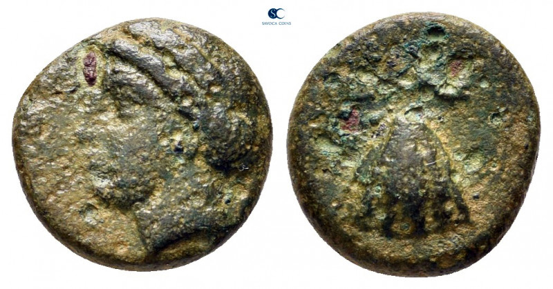 Caria. Iasos circa 380-340 BC. 
Bronze Æ

10 mm, 1,27 g

Head of Apollo lef...