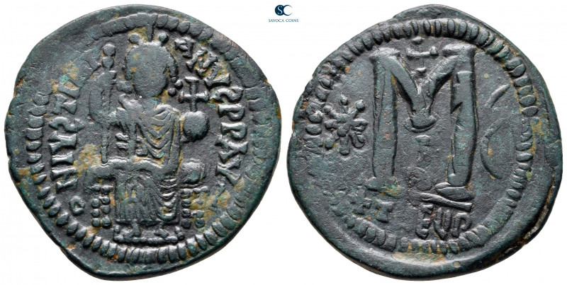 Justinian I AD 527-565. Theoupolis (Antioch)
Follis or 40 Nummi Æ

33 mm, 16,...