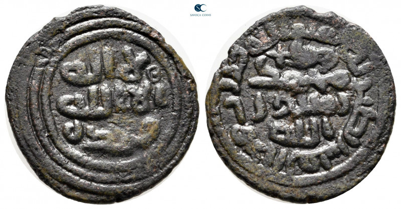 Umayyad Caliphate. Tabariya . 
Fals AE

21 mm, 3,03 g

Legend in three line...