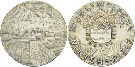 Innsbruck 1976, Olympic Games Silvered AE Participant's Medal 

A Collection of Olympic Medals. Austria. The XII. Winter Olympiad, Innsbruck 1976. S...
