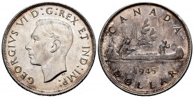 Canada. George VI. 1 dollar. 1945. (Km-37). Ag. 23,35 g. Lightly toned. Scarce. Almost XF. Est...150,00. 

Spanish description: Canadá. George VI. 1...