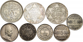 World Coins. Lot of 8 world coins; 3 from Morocco, 1/4 riyal 1331 H, 2 of 5 dirham 1320 H, 1323 H; 3 from Tunisia, 1 of 1 franc 1915, 2 of 5 franc 135...