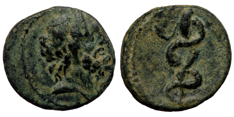 Mysia. Pergamon circa 200-100 BC. AE ( Bronze. 2.56 g. 15 mm)
Head of Asklepios ...