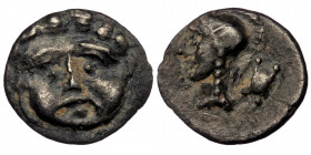 Pisidia, Selge AR Obol. Circa 350-300 BC. ( Silevr. 0.78 g. 11 mm) 
Facing gorgoneion with protruding tongue.
Rev: Head of Athena to left, wearing cre...
