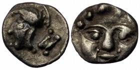 Pisidia, Selge AR Obol. Circa 350-300 BC ( Silver. 0.90 g. 11 mm). 
Facing gorgoneion with protruding tongue.
Rev: Head of Athena to left, wearing cre...