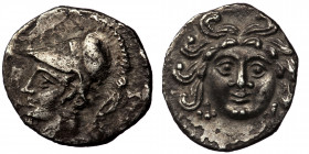 CILICIA. Uncertain. Obol (4th century BC). ( Silver. 0.66 g. 12 mm)
Gorgoneion.
Rev: Helmeted head of Athena left.
SNG BN 477; SNG Levante 248-9; Gökt...