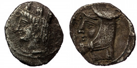 CILICIA, Uncertain. AR Obol 4th century BC. ( Silver. 0.69 g. 12 mm)
 Turreted head of female (Tyche or Tyche-Aphrodite?) left.
Rev. Head of male left...