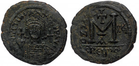 Justinian I, 527-565. Follis. Theoupolis (Antiochia), ( Bronze.22.85 g. 40 mm)
RY 16 = 542/3. 
D N IVSTINI-ANVS P P AVI Helmeted and cuirassed bust of...