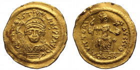 Justin II, 565-578. Solidus (Gold, 4.48 g. 20 mm) Constantinopolis, 566/7-578. 
D N IVSTINVS P P AVI Helmeted and cuirassed bust of Justin II facing, ...