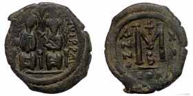 Justin II 565-578 AD, AE follis, Constantinople Mint, 575/576 AD ( Bronze. 12.25 g. 29 mm)
Justin II, on left, and Sophia, on right, seated facing on ...