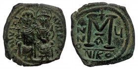 Justin II with Sophia, 565 - 578 AD AE Follis. Nicomedia ( Bronze. 12.70 g. 28 mm)
D N IVSTINVS PP V, Justin and Sophia seated facing side by side on ...