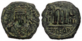 Mauricius Tiberius AE Follis, Theoupolis/Antioch mint AE Follis ( Byzantine. 10.34 g. 26 mm)
Bust facing, wearing crown with trefoil ornament, and con...