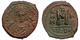 Maurice Tiberius 582-602 AD, AE follis, Theoupolis (Antioch) Mint, 595/596 AD ( Bronze. 11.21 g. 29 mm)
Crowned bust of Maurice Tiberius facing, weari...
