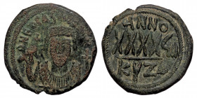 PHOCAS (602-610). Follis. Cyzicus. Dated RY 6 (607/8). ( Bronze. 12.99 g. 30 mm)
D N FOCAS PЄRP AVG./ Crowned bust facing, wearing consular robes and ...