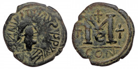 Justin I. AD 518-527. AE Follis Imitation of Constantinople mint, ( Bronze. 12.14. g. 30 mm)
Diademed, draped, and cuirassed bust right .
Rev: Large...
