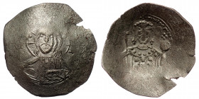 JOHN II COMNENUS (1118-1143) Constantinople, BI Aspron Trachy ( Silver.3.10 g 29 mm)
Nimbate Christ enthroned facing, wearing pallium and colobium, ho...