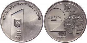 Israel 1 Sheqel 1987 JE5747
KM# 177; Silver 14.40g.; 20th Anniversary of United Jerusalem; Israel’s 39th Anniversary; Mintage 8107 Pcs; UNC